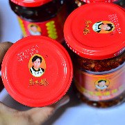马上评｜老干妈用AI把600名拣椒工裁到48人？宣传AI降本也别忘了人